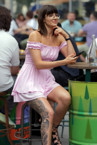 Young woman with tattoo